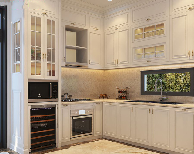 Tủ bếp làm bằng gỗ tự nhiên sơn trắng rất chắc chắn và sang trọng
