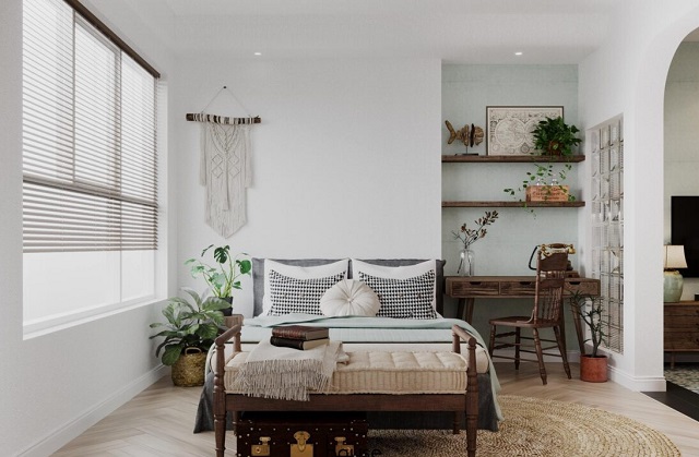 Giường ngủ được đặt đối diện với cửa phòng