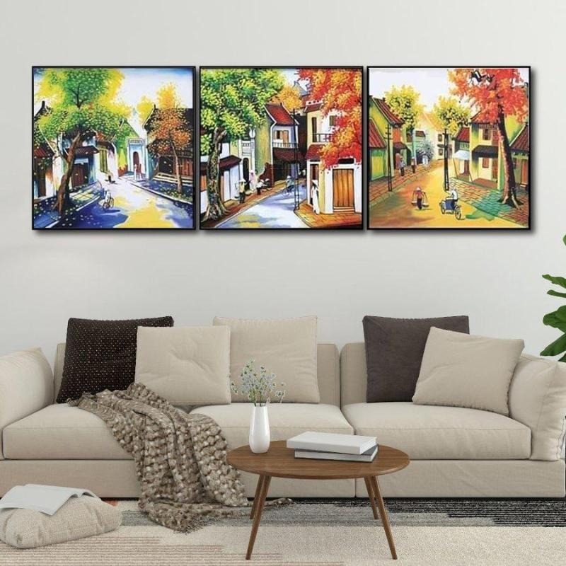 Ưu tiên các bộ tranh ghép ngang để tạo hiệu ứng kéo giãn chiều rộng cho bức tường